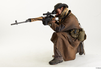  Photos Cody Miles Army Stalker Poses aiming gun kneeling whole body 0002.jpg